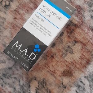 M.A.D Skincare Acne Drying Lotion - White & Black with Blue Accents